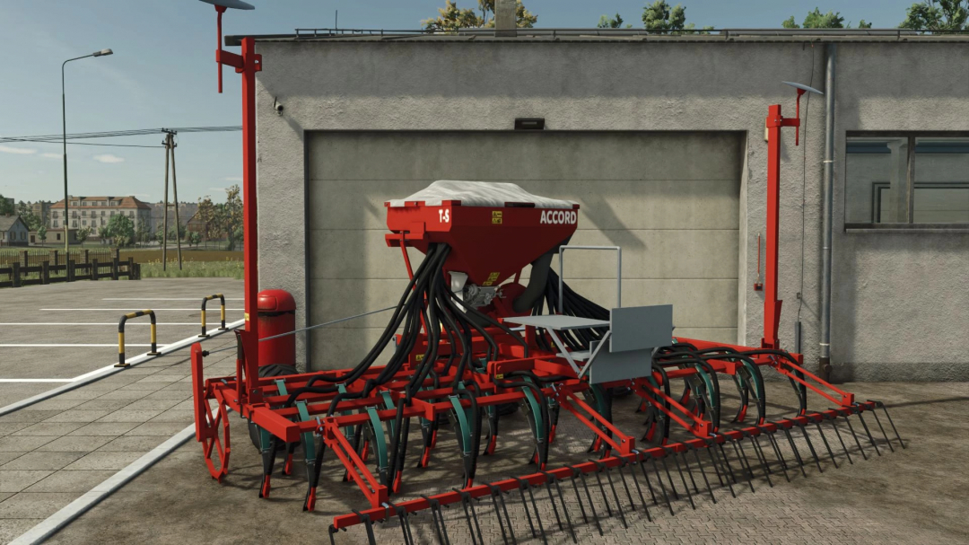 Kverneland TS-Drill mod in FS25, showing a red seeder parked by a building.