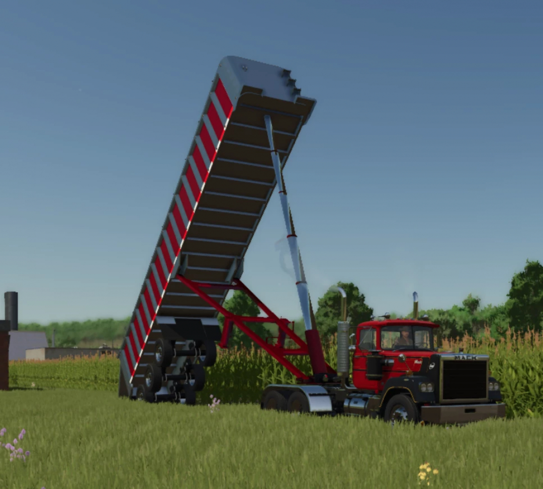 Lizard frameless end dump mod in FS25, showcasing a red truck in a field with the trailer raised. Farming Simulator 25 mod.