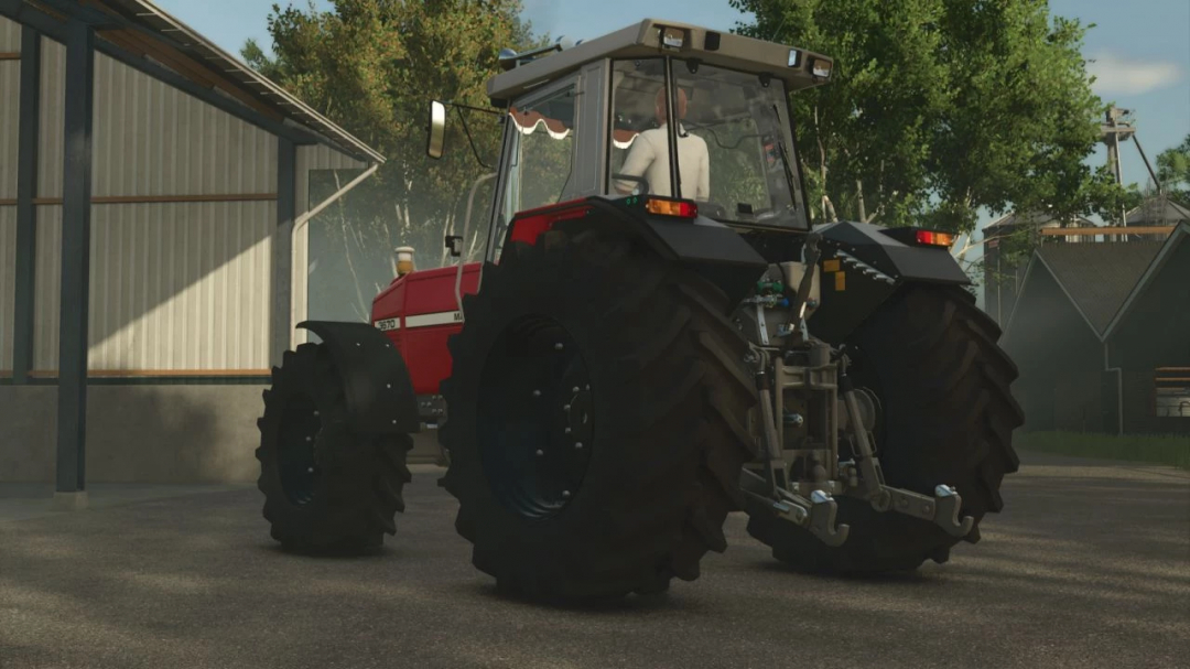 Massey Ferguson 3670 tractor mod in Farming Simulator 25, showcasing rear view in a farm setting.