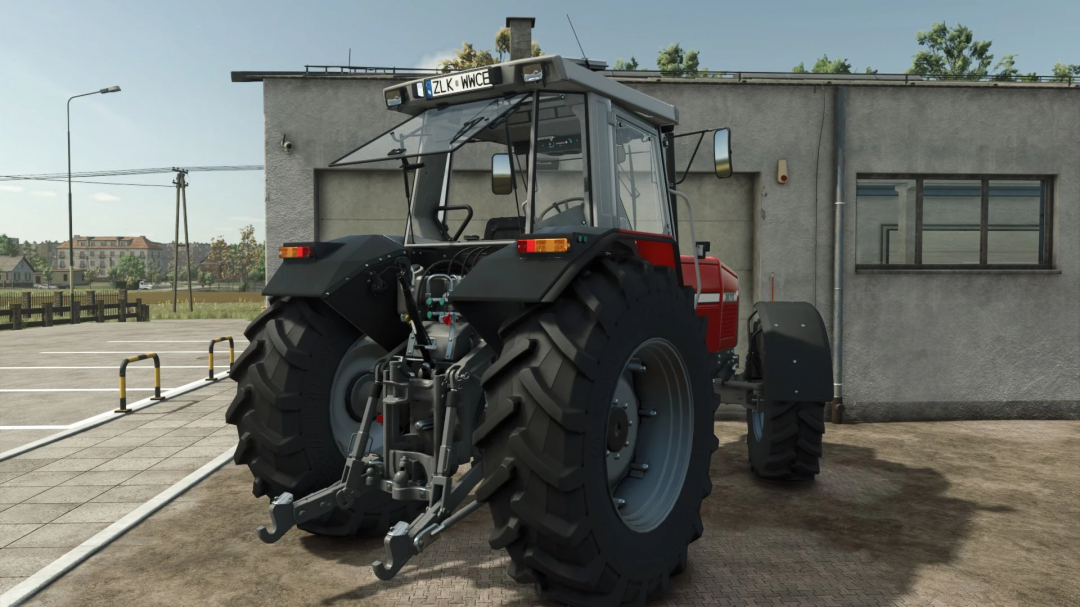 Rear view of Massey Ferguson 3670 tractor mod for FS25 by Miziuu, version 1.0.0.0, parked near a building.