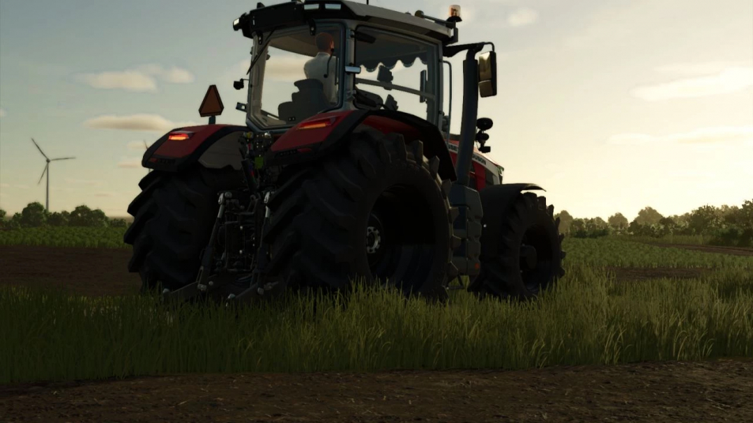 Massey Ferguson 8S tractor in FS25 mod on a field at sunset.