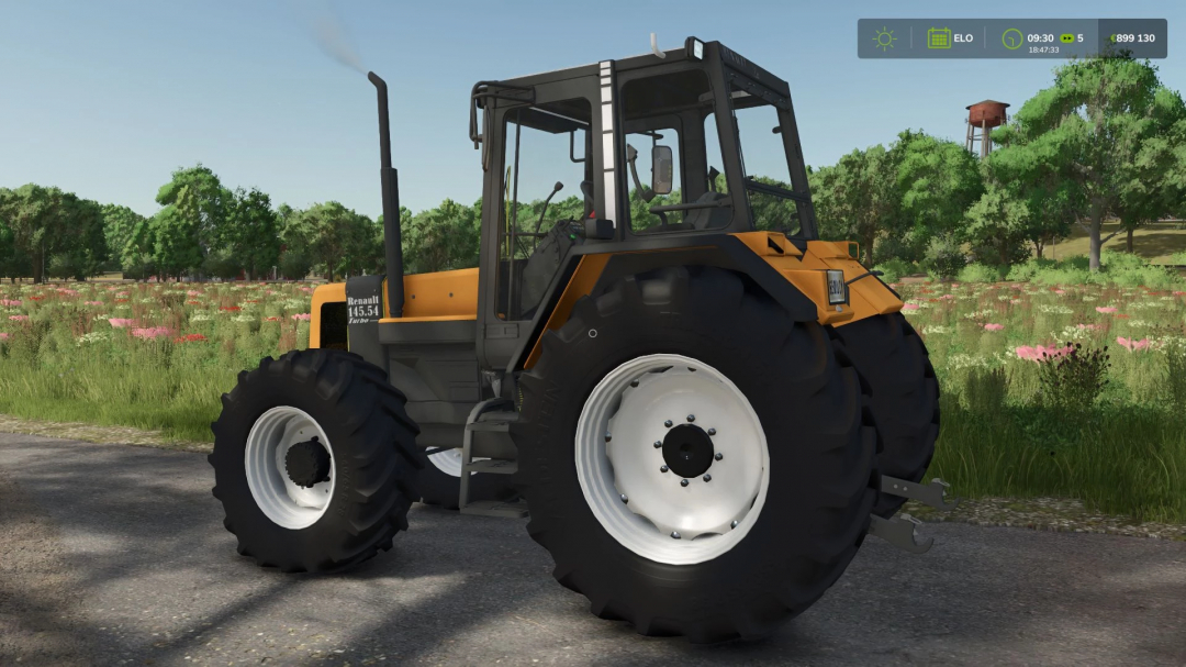 Renault TZ tractor mod in FS25, displayed in a field setting with lush greenery.