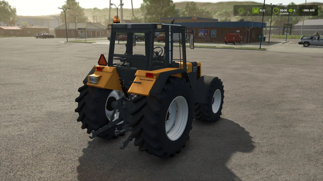 Renault TZ tractor mod for Farming Simulator 25 displayed in a parking area. FS25 mods enhance gameplay with realistic machinery.