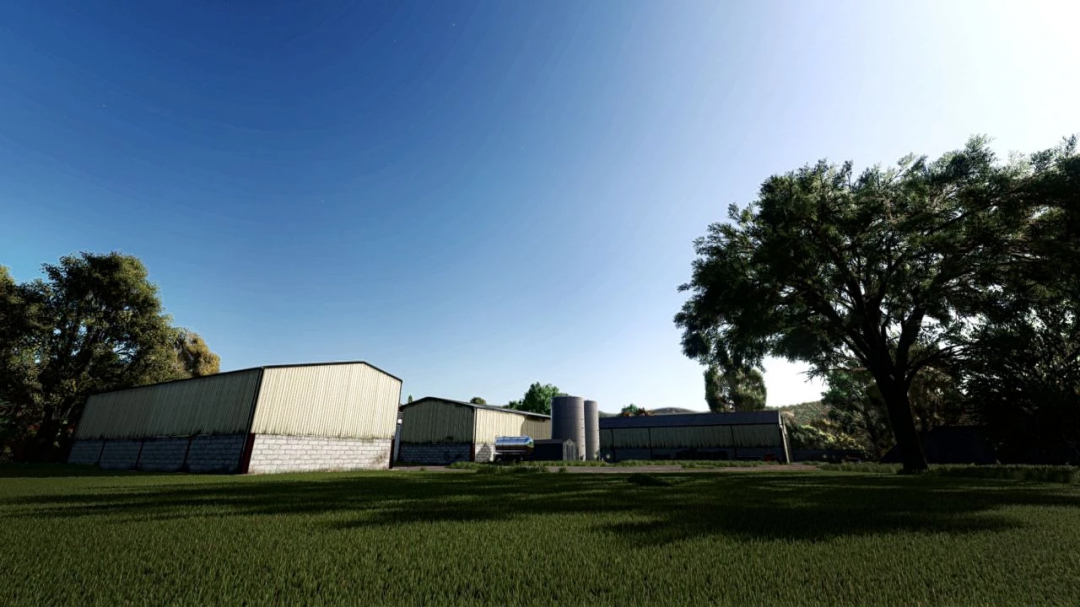 Farm buildings and lush trees under a clear sky in FS25 mod Shader MKSHV1 v1.1.0.1.