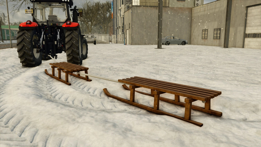 FS25 mod Sledge v1.0.0.0 showing a wooden sled attached to a tractor in a snowy setting.