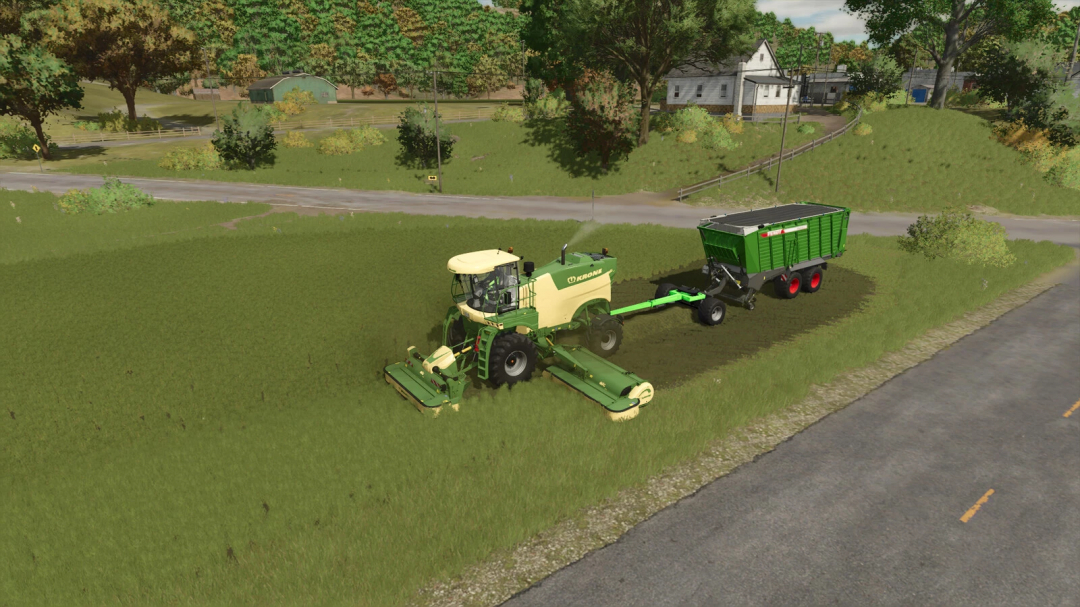 FS25 mod Snüfelstück v1.0.0.0 featuring a green Krone harvester and trailer working on a lush field.