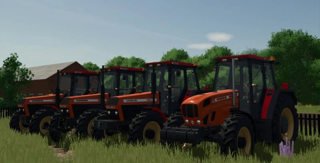 Four orange tractors from the URSUS PACK 1234-1734 v2.0.0.0 mod in FS25, lined up on a farm.