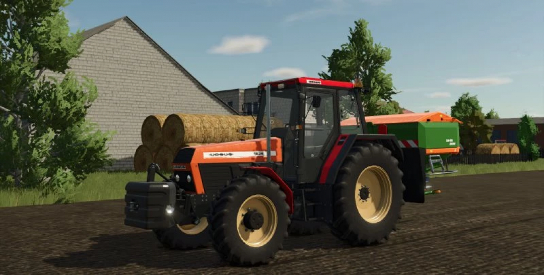 URSUS tractor in Farming Simulator 25 with URSUS PACK 1234-1734 v2.0.0.0 mod, featuring farming equipment and hay bales.