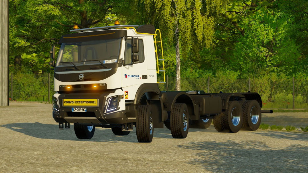 Volvo FMX Ampiroll 8x4 truck mod for Farming Simulator 22, parked on a gravel path in a lush green forest setting.