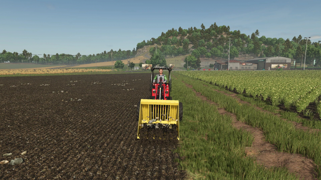 FS25 mod Weidemann Schäffer loader v1.0.0.0 in action on a farm field with crops and machinery.