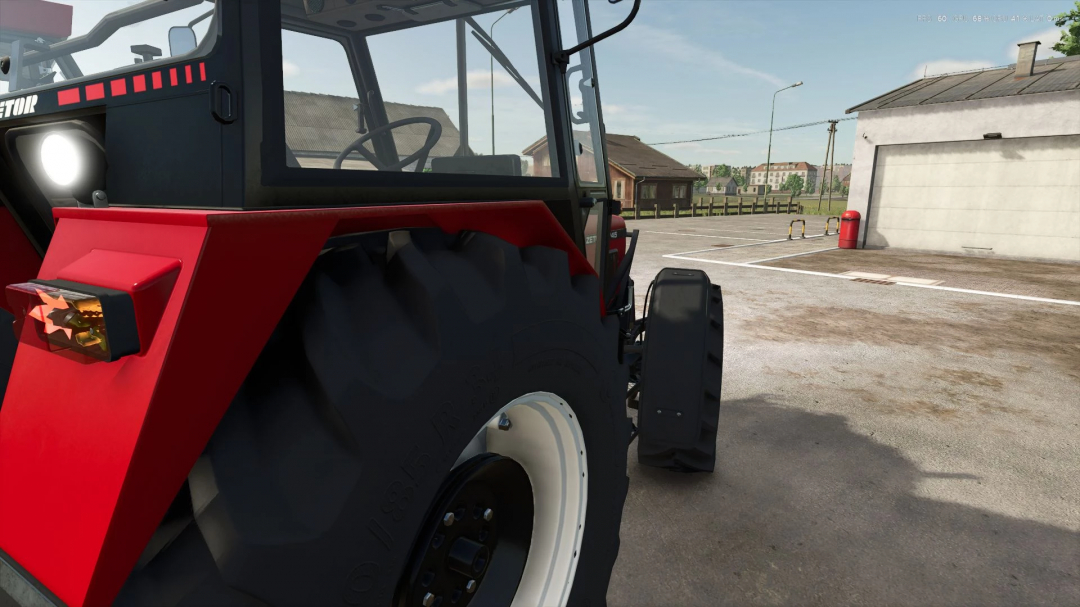 Close-up of Zetor 62-7745 Edit tractor in FS25 mod, highlighting rear tire and exterior details.