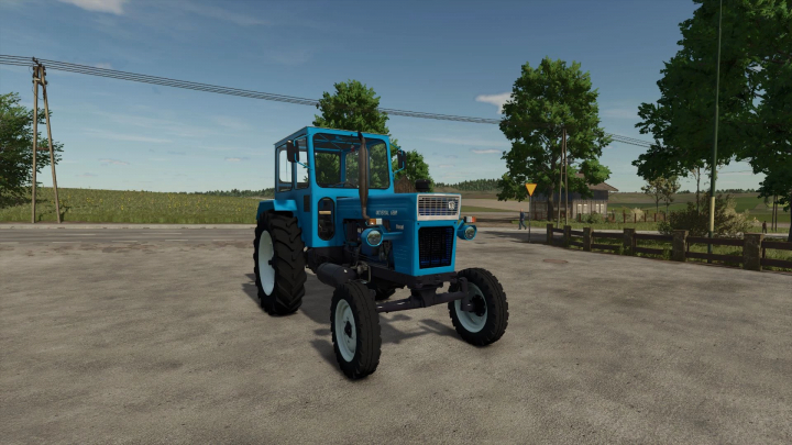 fs25-mods,  U650 Albastru tractor mod in FS25 game, showcasing a classic blue design in a rural setting.