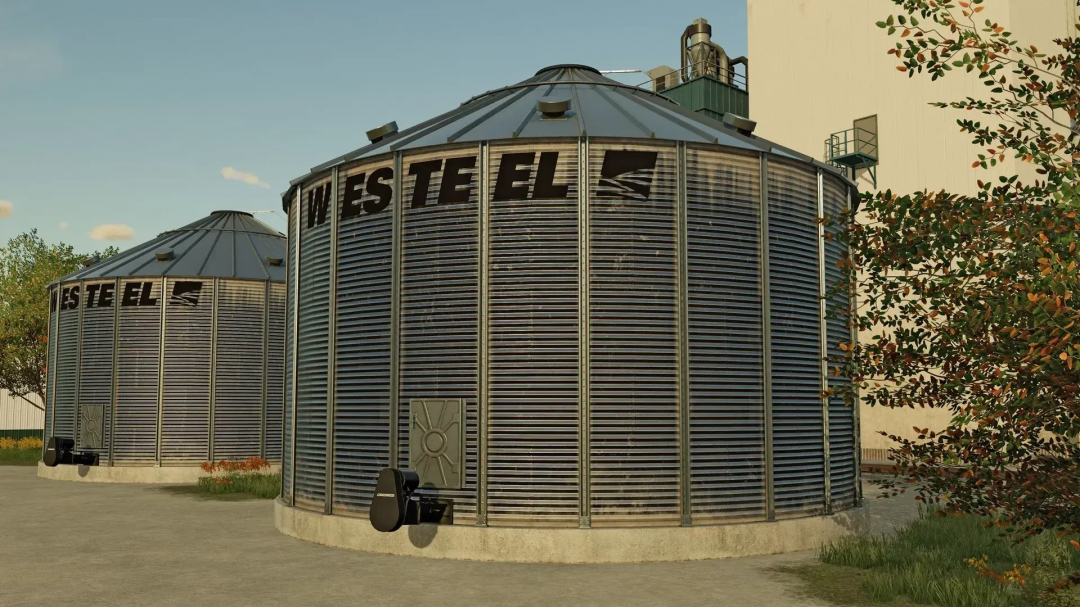 Large grain silos from AGI Pack v1.0.0.0 in Farming Simulator 25 mod, featuring detailed textures and realistic design.