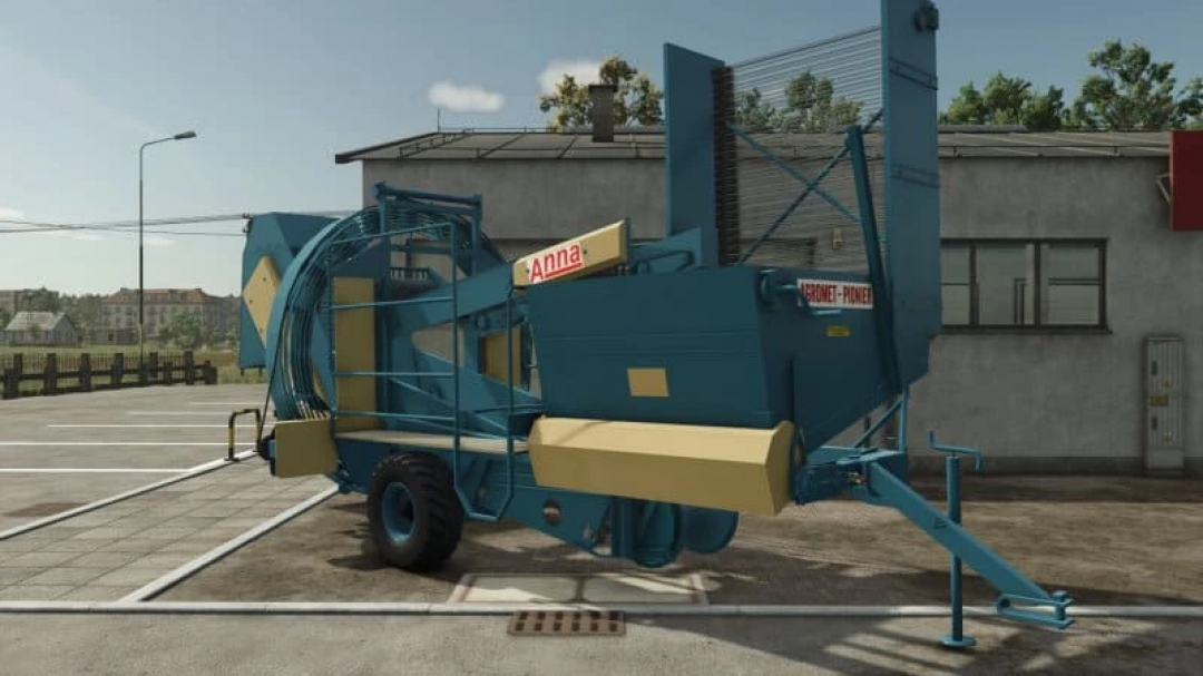 FS25 mod Agromet Z644 v1.0.0.0, a blue and yellow potato harvester parked on a lot in Farming Simulator 25.