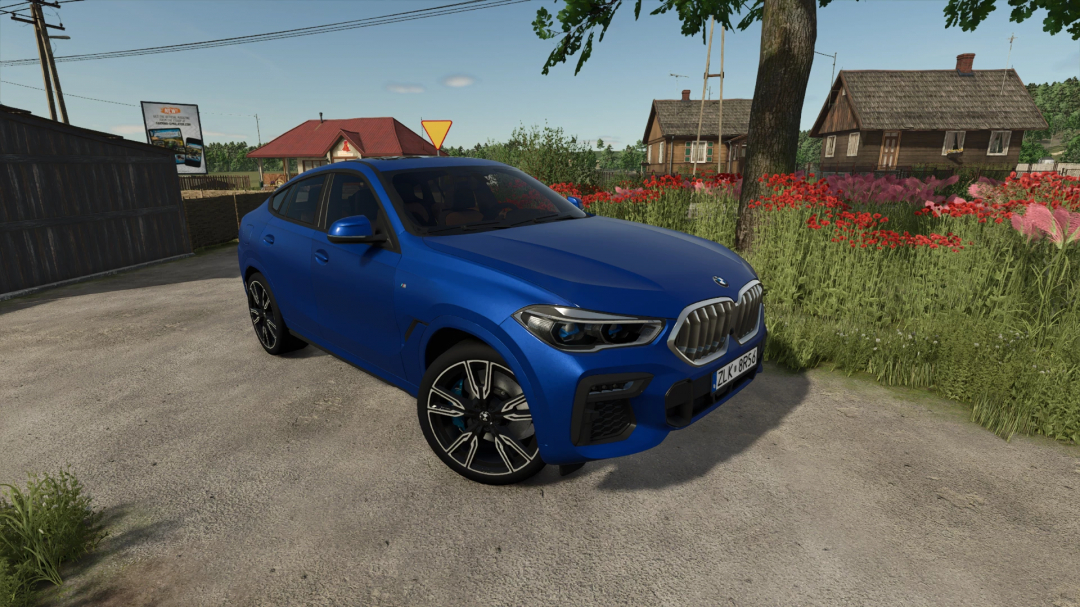 Blue BMW X6 M-Sport 2020 mod for FS25 parked on rural road