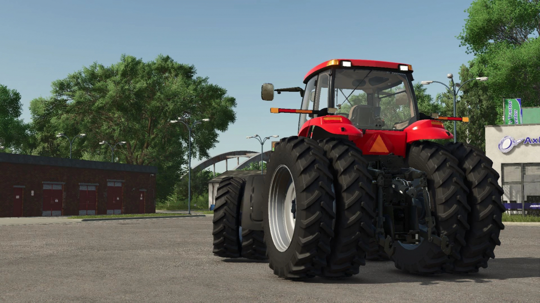 Case IH Magnum 2011 tractor mod in FS25 near buildings and trees