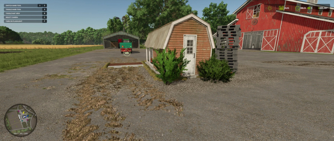 FS25 mod image showing Chicken Coop v1.0.0.0 in a farm setting with a red barn and greenery.