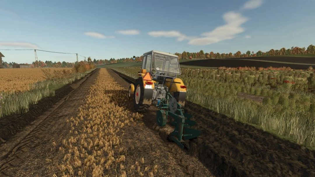 FS25 Unia Grudziadz U023 mod plowing field in Farming Simulator 25