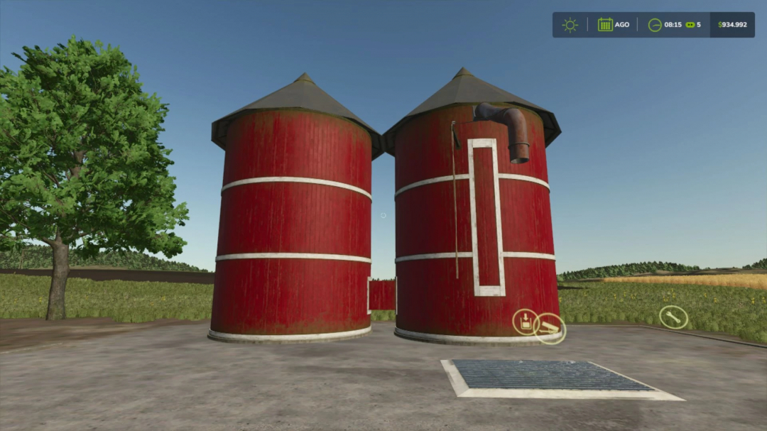 Red fermenter silos in Farming Simulator 25 mod Fermenter Silo v1.2.0.0 on a sunny day.