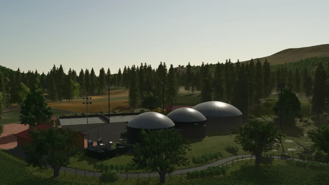 FS25 Garbindel mod v1.0.1.2 showing a rural landscape with biogas plant and forest in Farming Simulator 25.