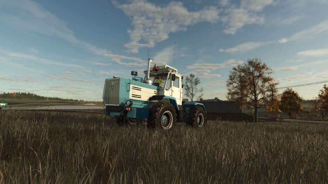 HTZ T 150K V8 tractor on a field in FS25 mod.