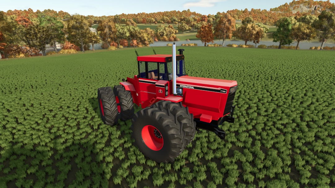 International 7788 tractor mod in FS25, showcasing vibrant red design on a lush green field.