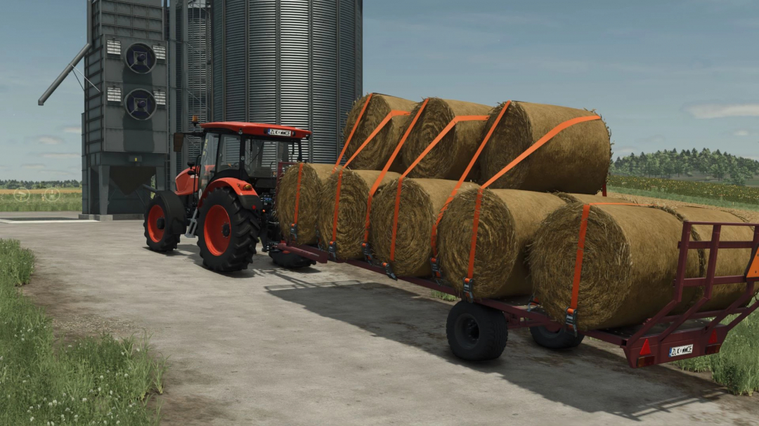 FS25 mod Lizard G54 Bale trailer v1.0.0.0 carrying hay bales next to a tractor and silo.