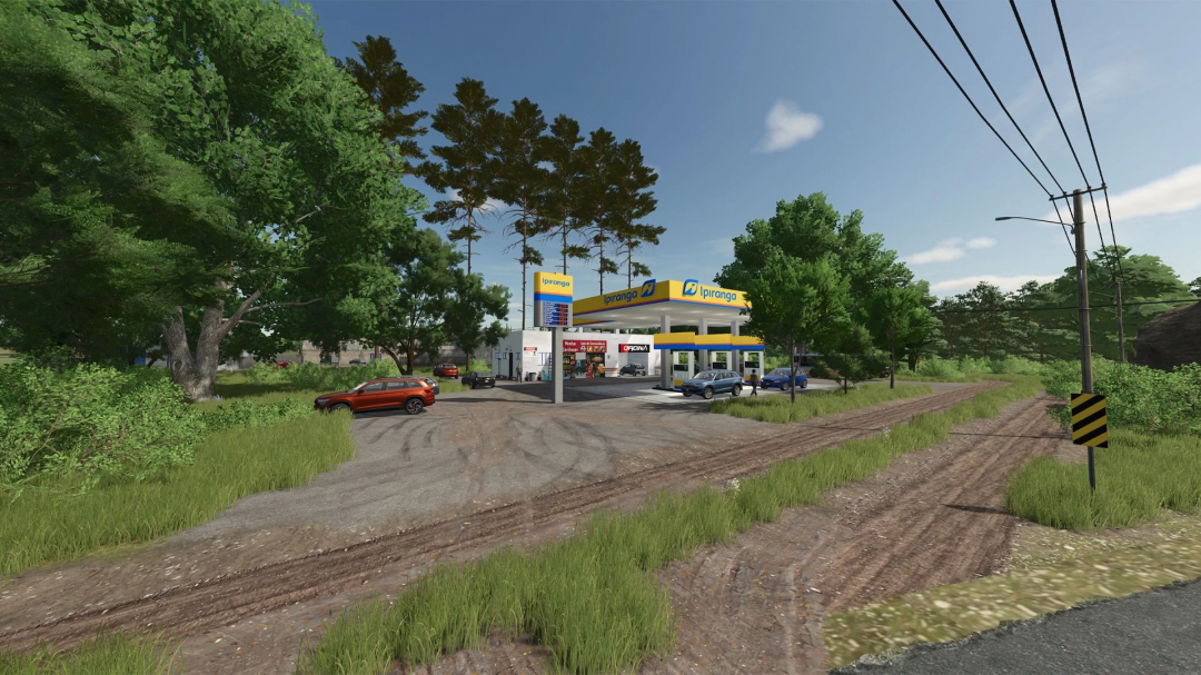 FS25 mods, Mato Grosso v1.0.0.0 depicts a gas station surrounded by greenery under a clear sky in Farming Simulator 25.