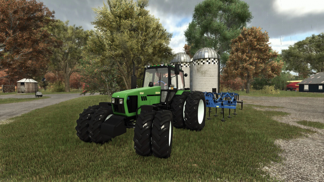 Green tractor MTZ-1221 v1.0.0.1 mod in FS25, parked on grassy field with silo in background.