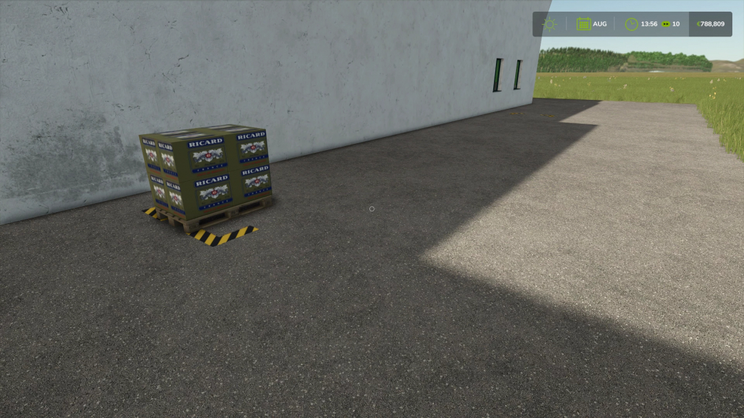 FS25 mod RICARD PRODUCTION showing a pallet of Ricard boxes against a wall, used in Farming Simulator 25.