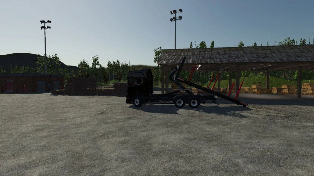 FS25 mod Scania R ITR Pack truck parked near a shed, featuring lifting equipment.