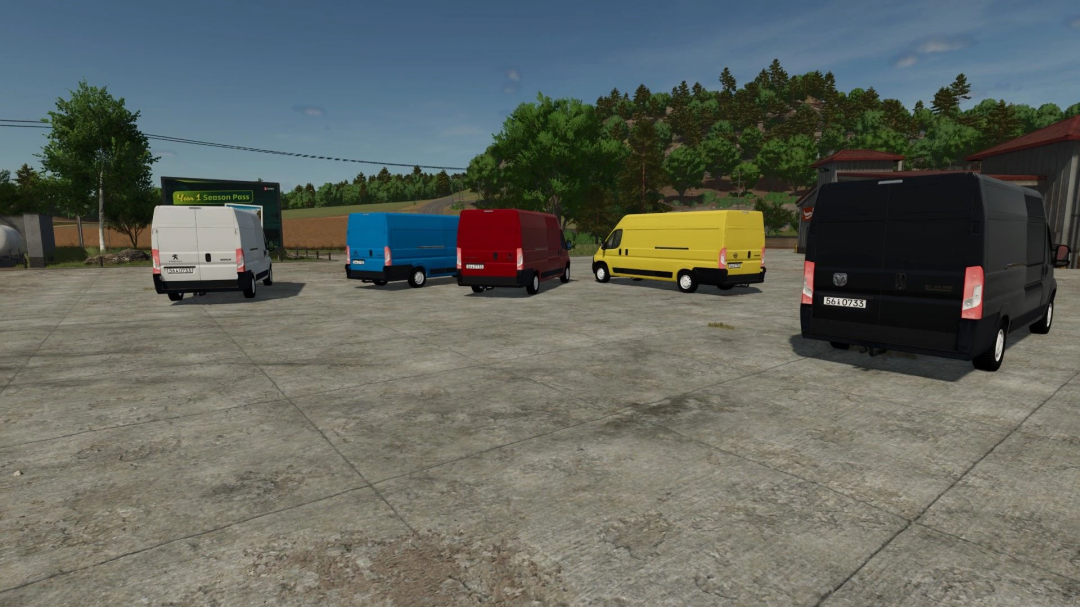 Five colorful vans from the Stellantis Pack Van 2023 mod for FS25 parked on a concrete lot.