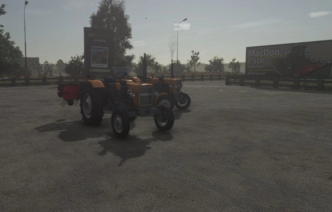 FS25 mods: Ursus C-330 by WafelekLS v1.0.0.0, featuring two vintage tractors parked in an open area with a MacDon Pack advertisement.