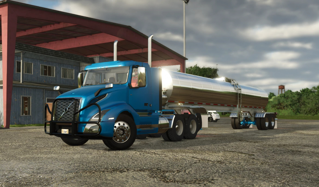 Walker Food Grade Tanker FS25 mod in blue truck, parked in farmyard, Farming Simulator 25.