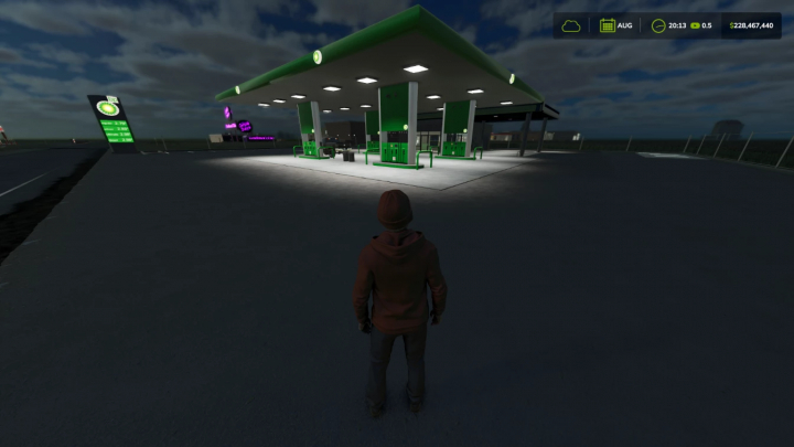 fs25-mods,  BP Gas Station mod in Farming Simulator 25, featuring a brightly lit station with green accents at night.