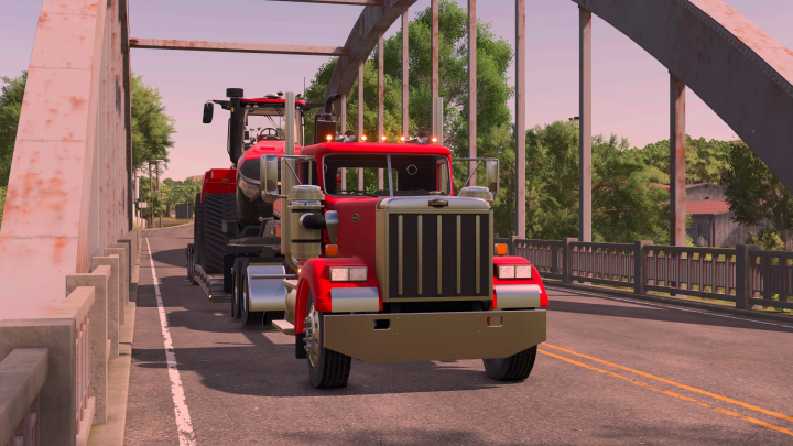 fs25-mods,  FS25 Autocar v1.0.0.0 mod showcasing a red truck hauling equipment on a bridge in Farming Simulator 25.