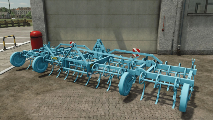 fs25-mods,  Fortschritt B-231 cultivator mod for Farming Simulator 25, showcasing blue agricultural equipment in a farmyard setting.