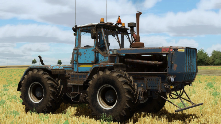 fs22-mods,  KhTZ-150K-D260 tractor mod in FS22, showcasing a vintage, weathered design on a grassy field. Ideal for Farming Simulator 22 mods.