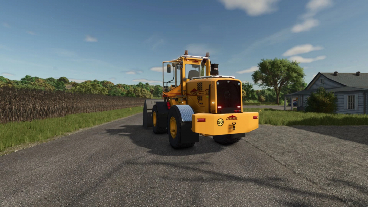 fs25-mods,  Rear view of yellow Ljungby loader on a rural road in FS25 mods.