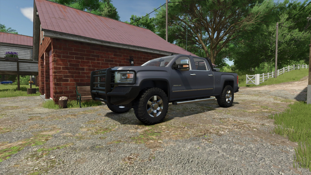 2018 GMC Sierra 2500 in FS25 mod parked by a barn, showcasing detailed vehicle design in Farming Simulator 25.