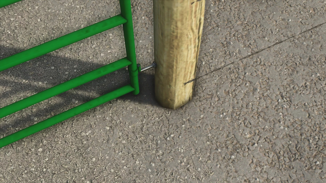 Close-up of a green metal gate attached to a wooden post on a textured surface in FS25 mod American Fence and Gates v1.0.0.0.