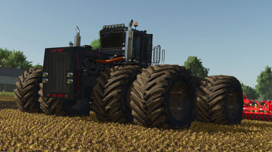 Big Bud 747 tractor in FS25 mod v1.2.0.0, showcasing its large tires on a farm field.