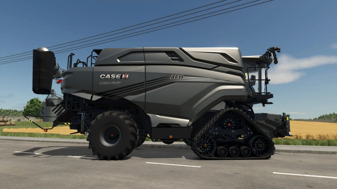 Case IH harvesting machine from FS25 mods, in a field on a sunny day.