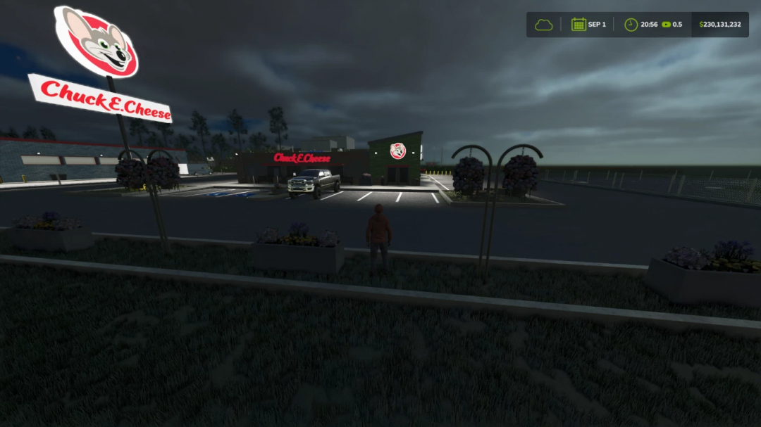 FS25 mod Chuck E Cheese v1.0.0.0 features a parking lot with a Chuck E Cheese sign at night in Farming Simulator 25.