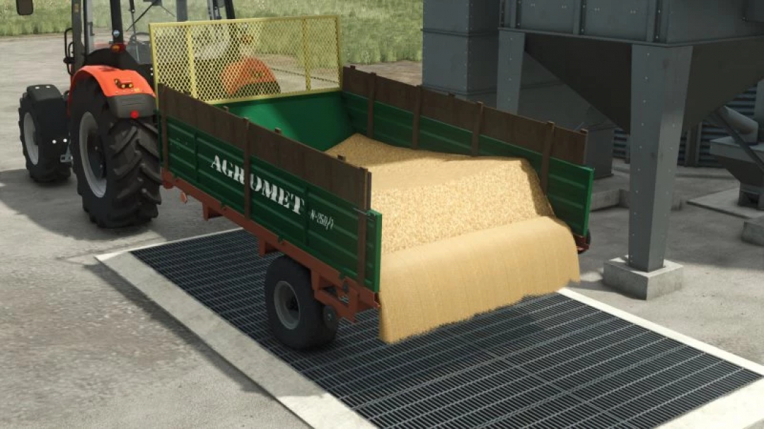 FS25 Agromet/Warfama N-250/1 mod showing a tractor unloading grain.