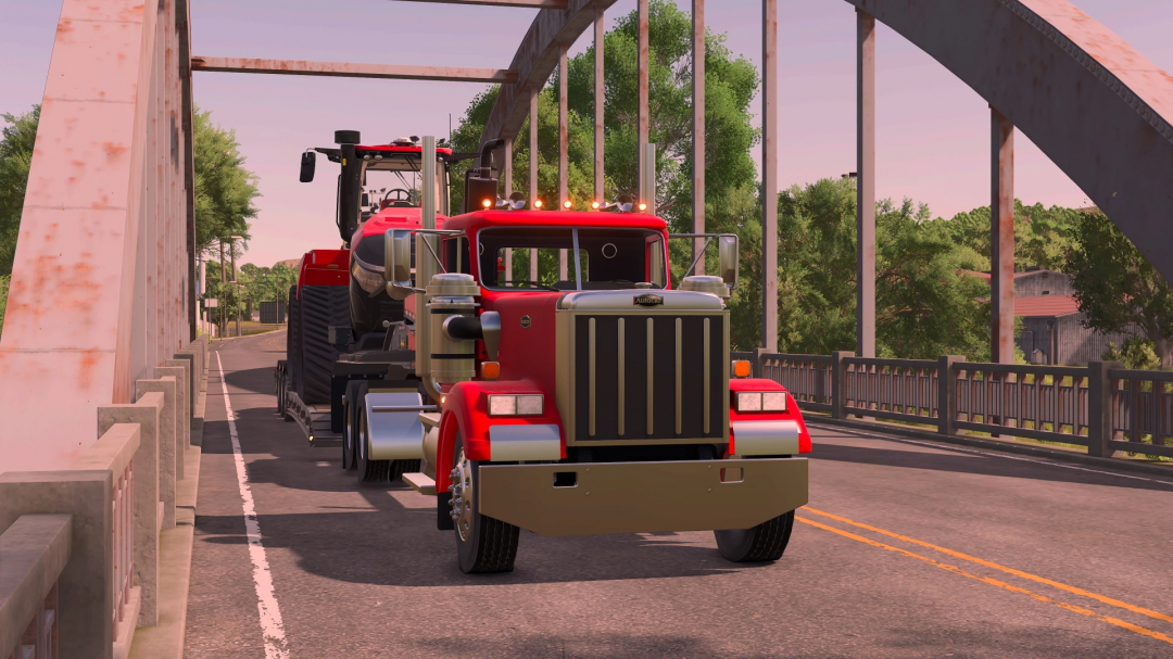 FS25 Autocar v1.0.0.0 mod showcasing a red truck hauling equipment on a bridge in Farming Simulator 25.