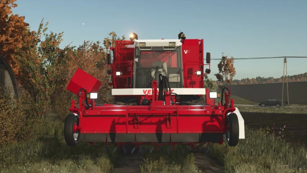 Front view of FS25 Vervaet 17t mod in Farming Simulator 25, showcasing its red harvesting equipment. FS25 mods enhance gameplay.