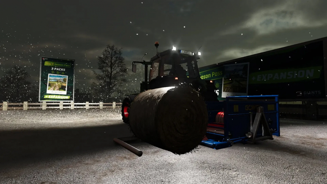 FS25 mod Göweil RBA bale shredder in snowy night setting, featuring tractor and bale.