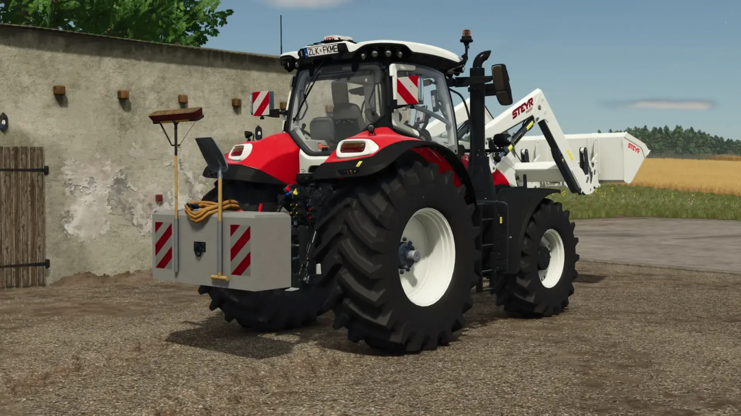 FS25 mod Hof Weight v1.0.2.0: Tractor with front weight block in a farmyard setting.