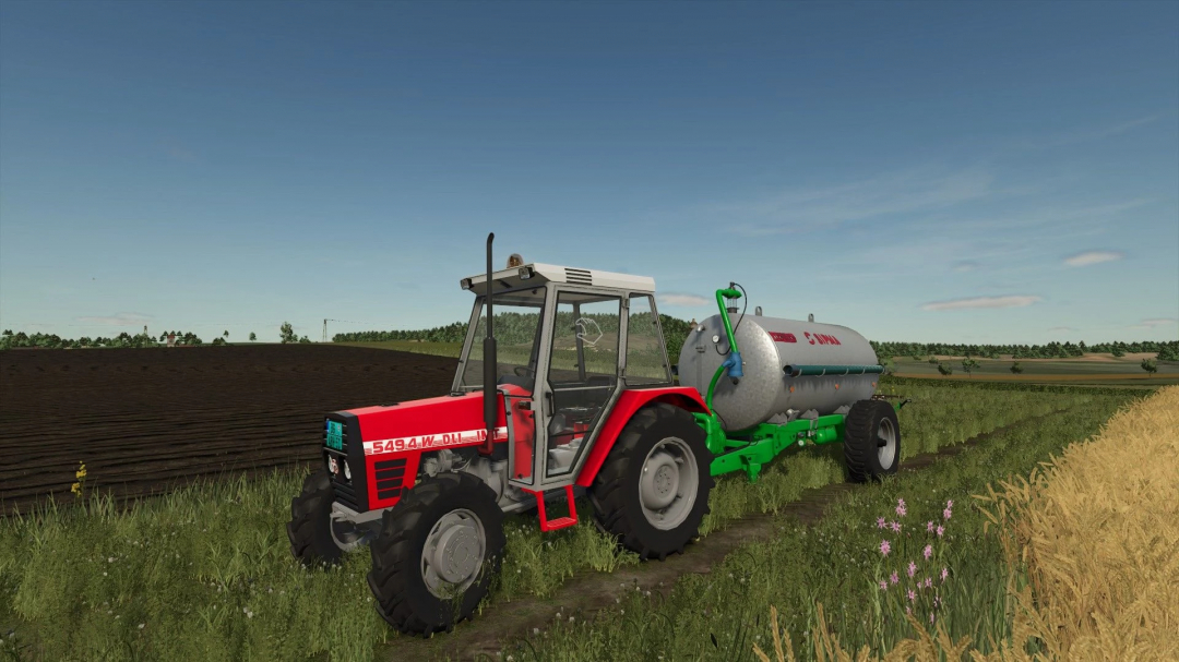 FS25 mod IMT 549 W DLI tractor on a farm field with a trailer, showcasing Farming Simulator 25 mods.